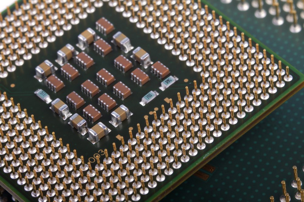 Researcher holding microchip